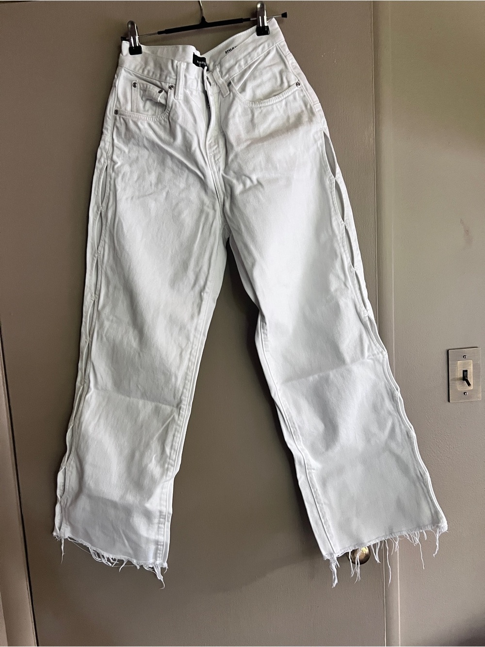 White Flared Women’s Jeans with Raw Hem